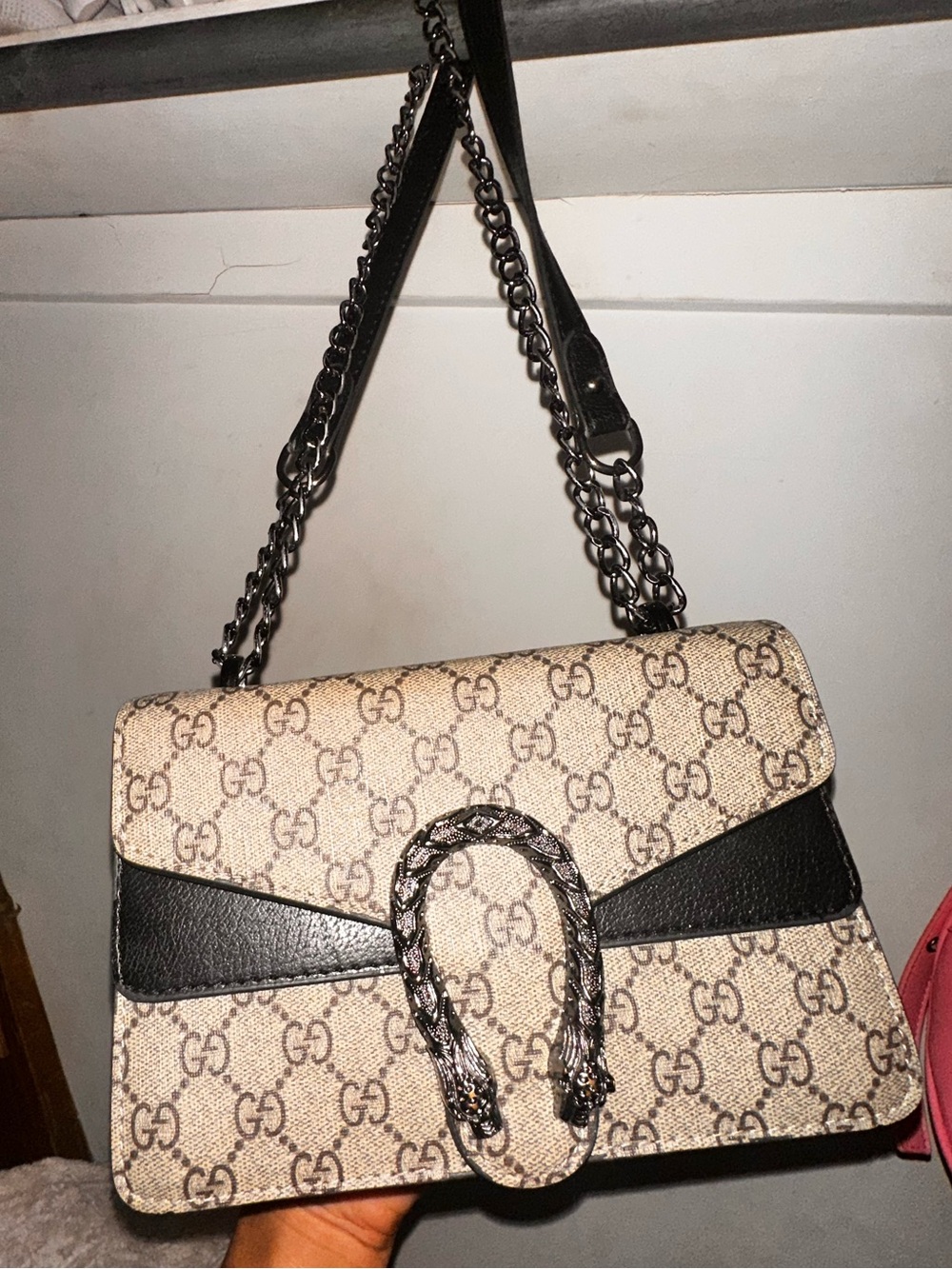Guccis Beige Monogram Chain Shoulder Bag with Black Trim